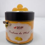 Lata de piedras de miel de flores